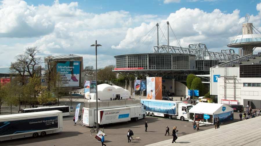 Wide view of the Hannover Messe fairgrounds in Germany, with exhibition halls and visitors